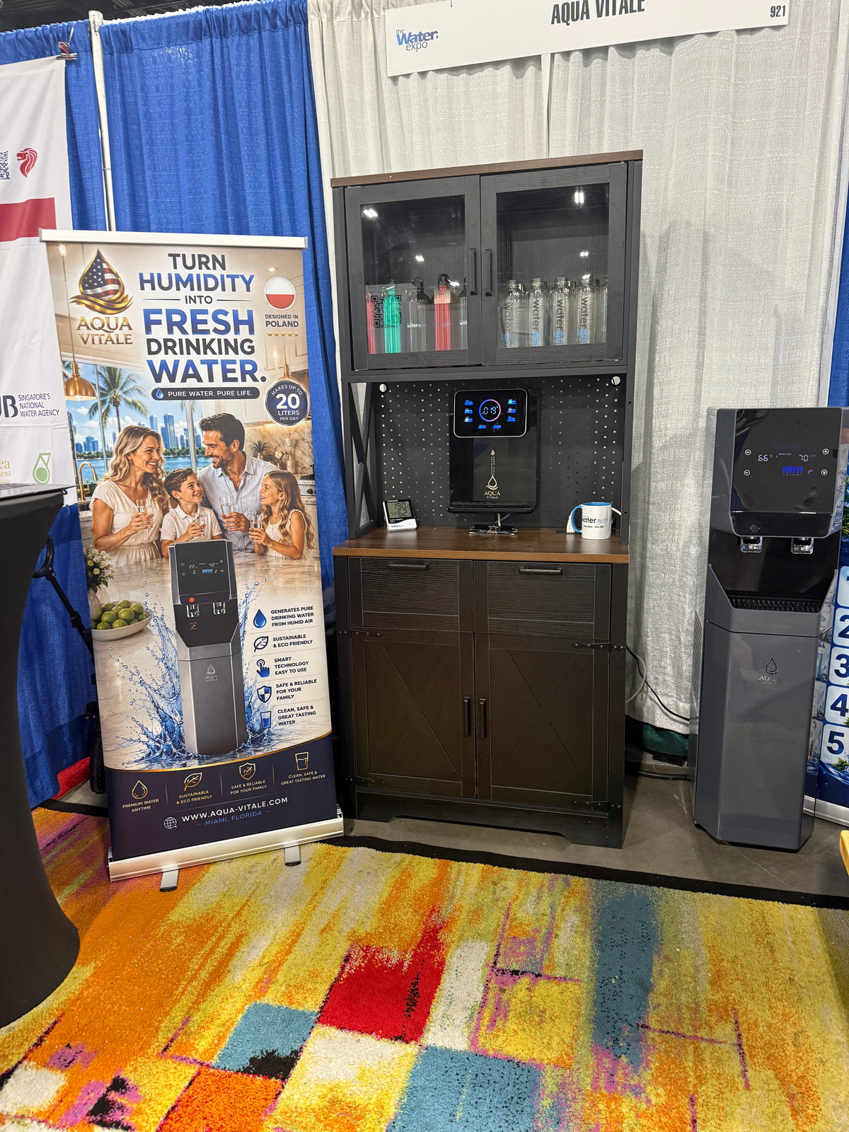 Aqua Vitale A20L display at trade show with product information banner