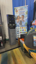 Aqua Vitale A20L touchscreen dispenser displayed at trade show booth